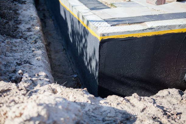 Professional Waterproofing technician working in Sodus, NY